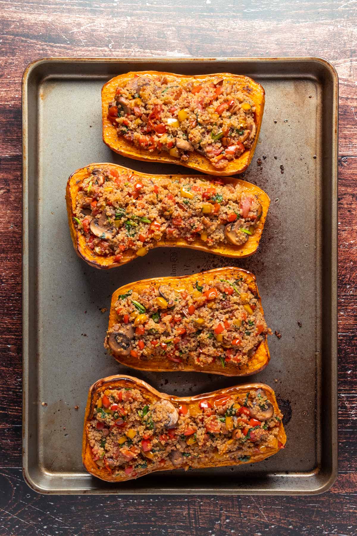 Quinoa and veggie filling added to butternut squash and baked. 