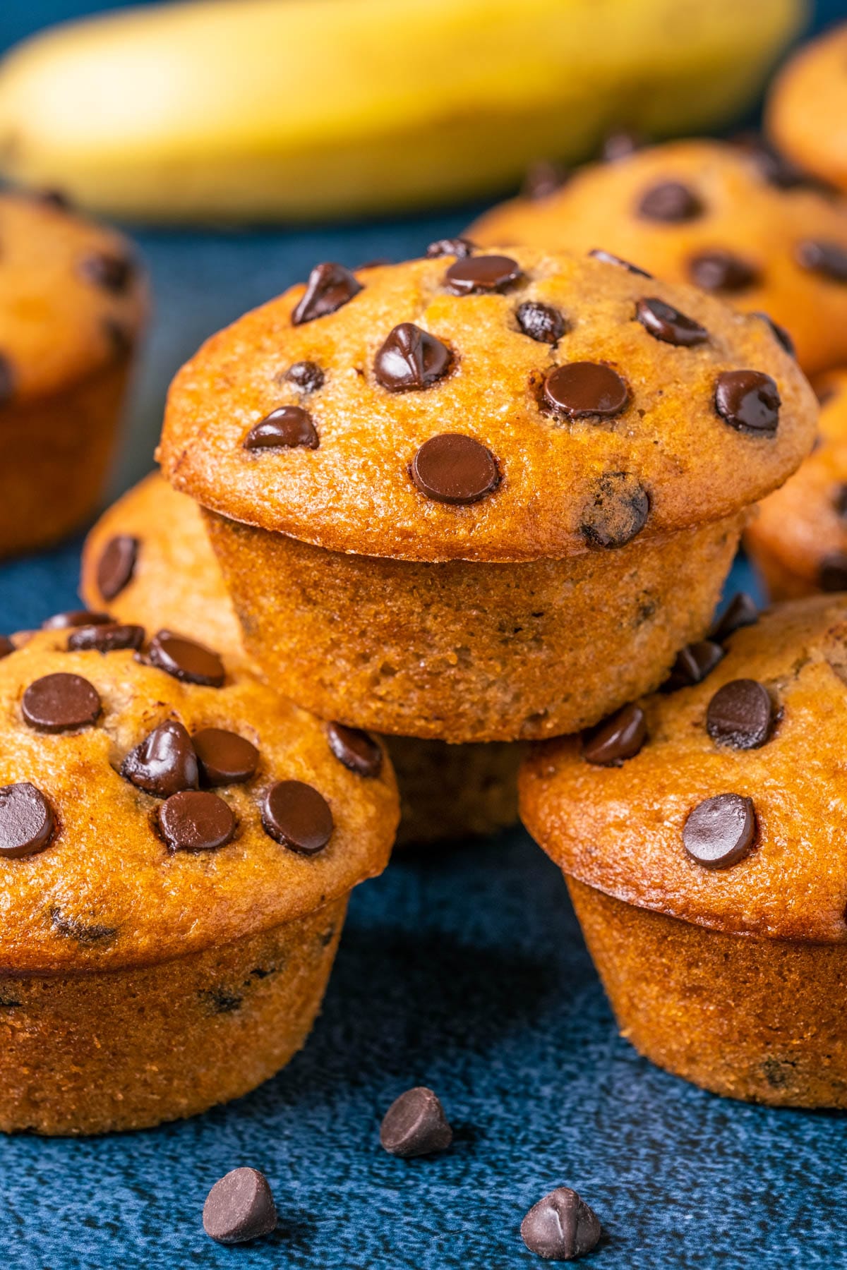 Vegan banana chocolate chip muffins in a stack. 