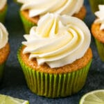 Vegan key lime cupcakes and fresh lime slices.