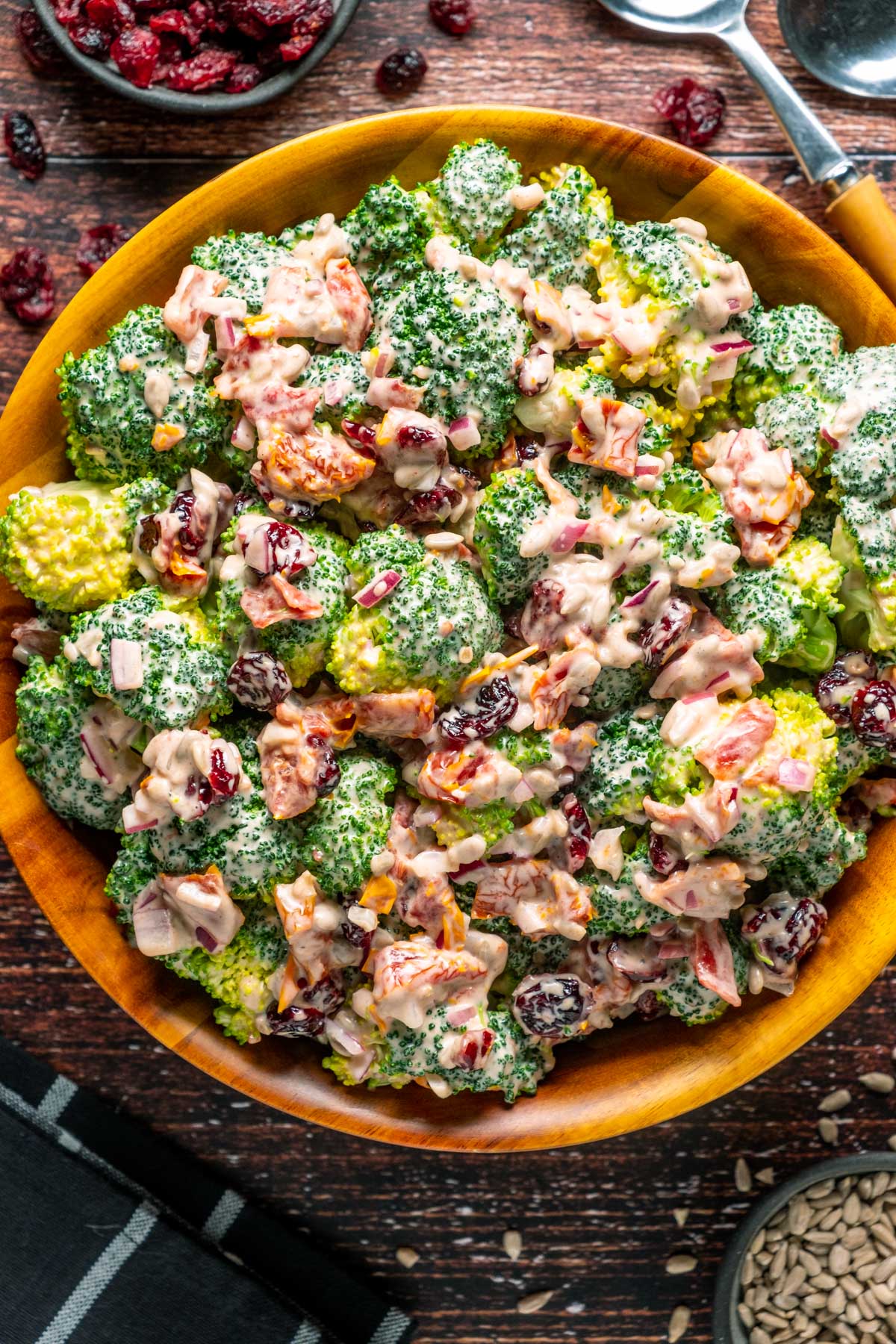 Vegan broccoli salad in a wooden bowl. 