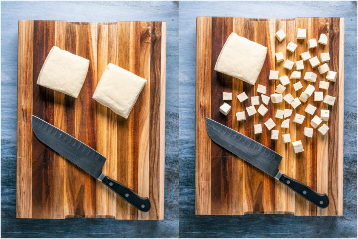 Blocks of tofu on a wooden cutting board and then cut into cubes.