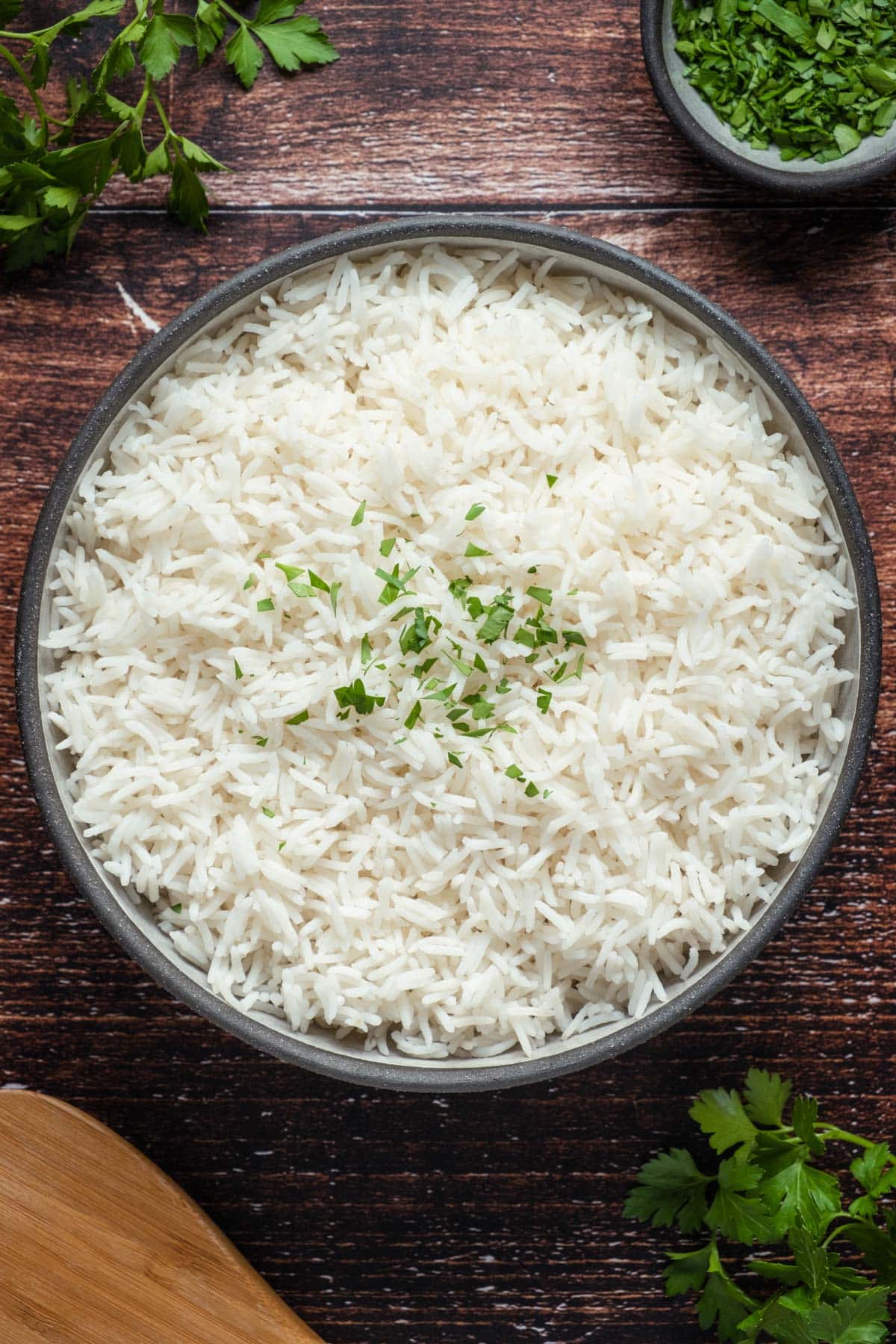 Basmati rice topped with fresh parsley. 