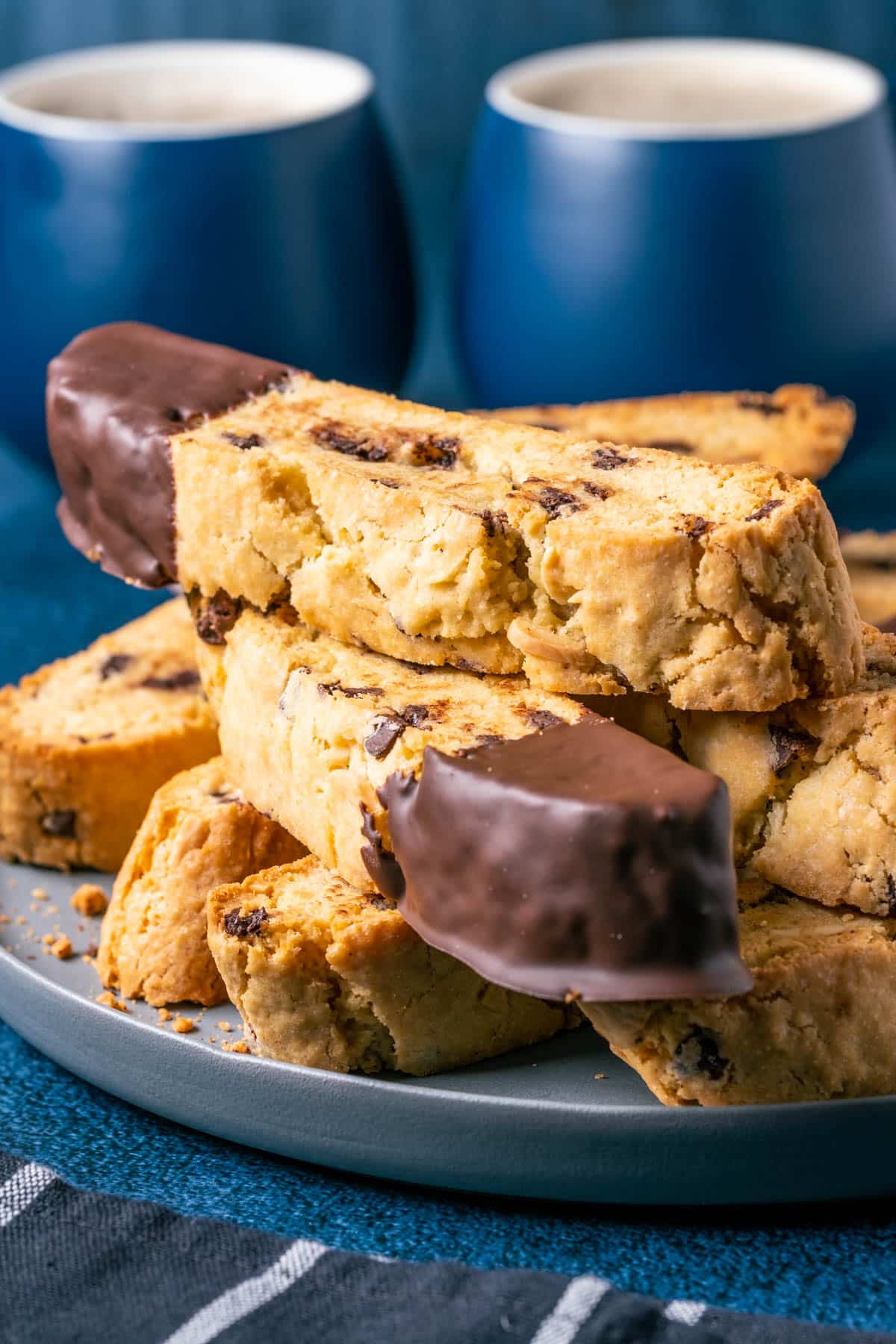 Biscotti stacked up on a plate.