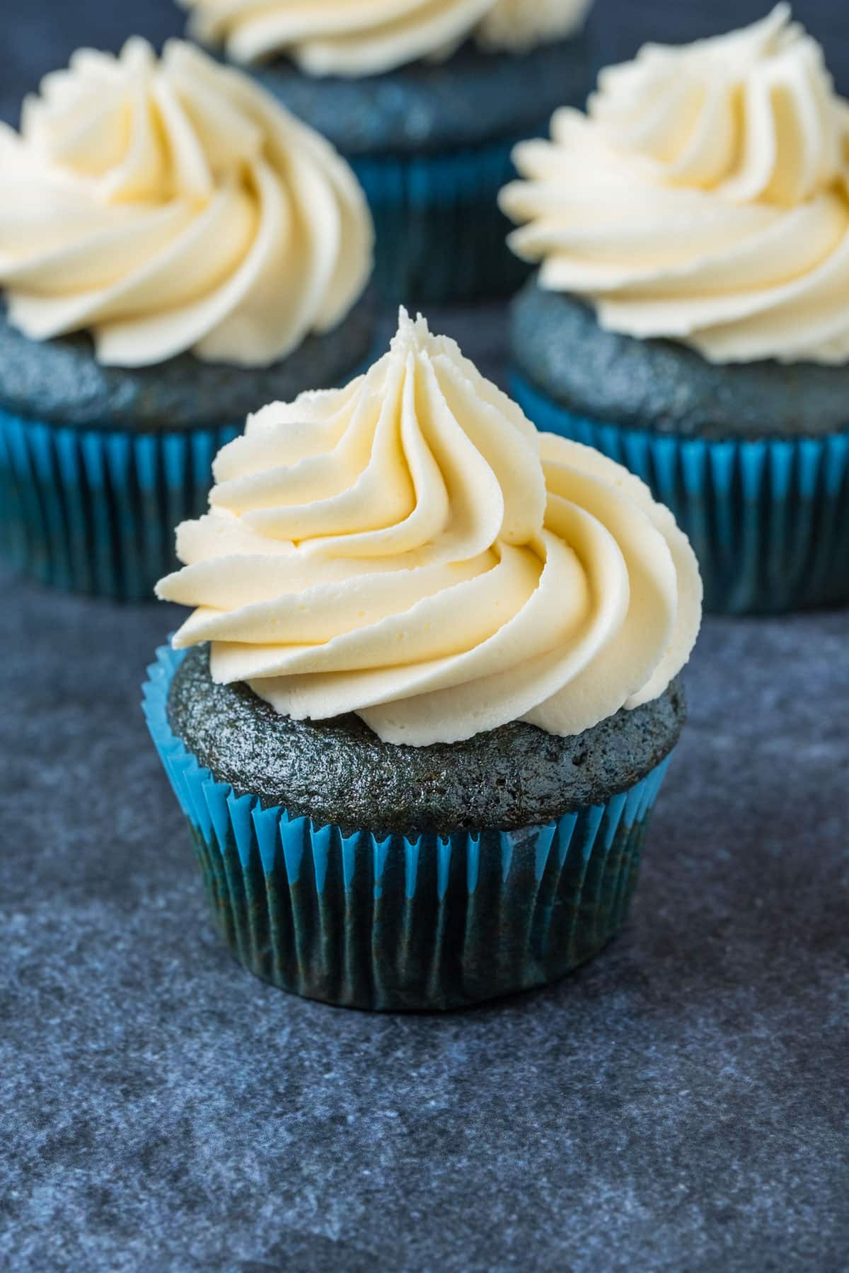 Vegan blue velvet cupcakes topped with a tangy vegan buttercream. 