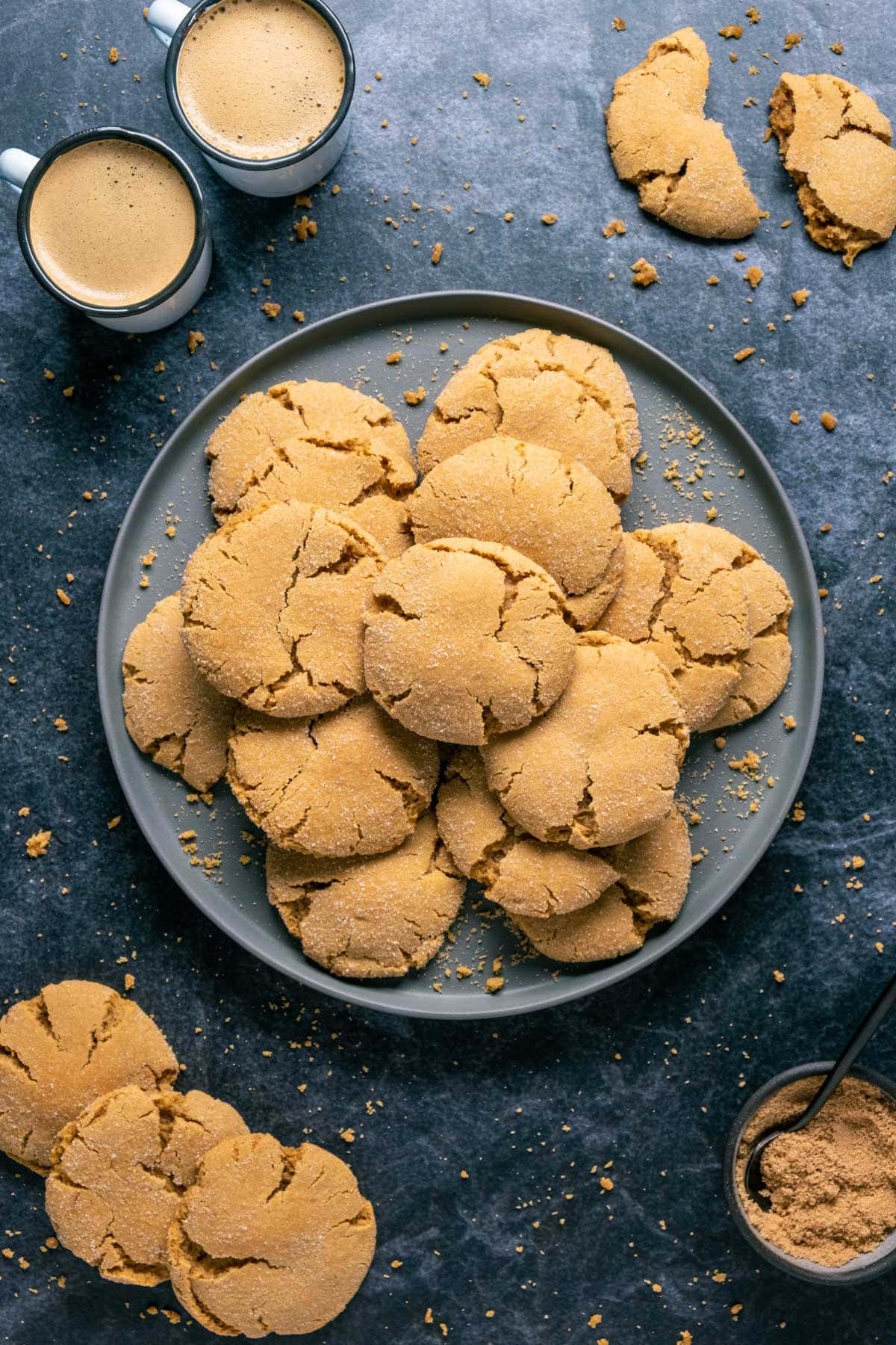 Vegan brown sugar cookies stacked on a gray plate.