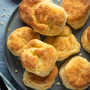 Vegan Buttermilk Biscuits on a gray plate.